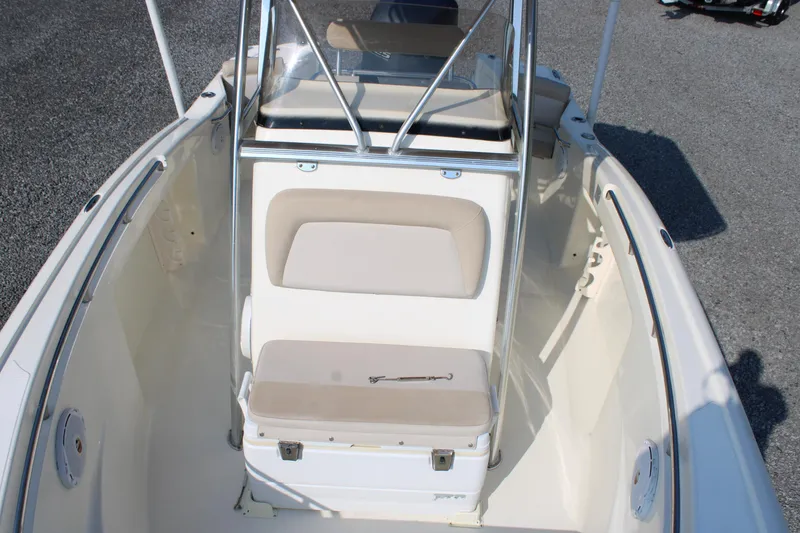 Slide: The Image of 2007 Scout 222 Sportfish boat interior with seating and windshield, viewed from above. - 18
