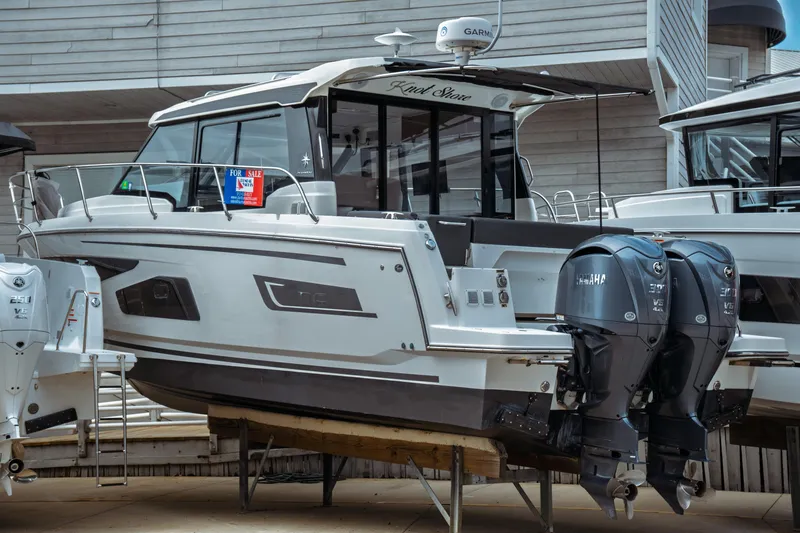 Slide: The Image of 2023 Jeanneau NC 1095 boat for sale, featuring dual Yamaha engines. - 0