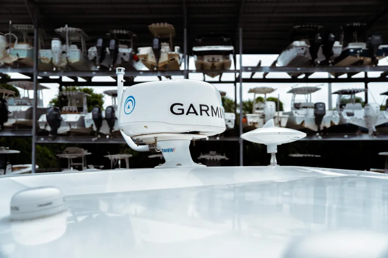 Slide: The Image of Garmin radar on 2023 Jeanneau NC 1095 boat, with stacked boats in background. - 20