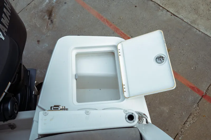 Slide: The Image of Open storage compartment on 2023 Jeanneau NC 1095 boat deck. - 25