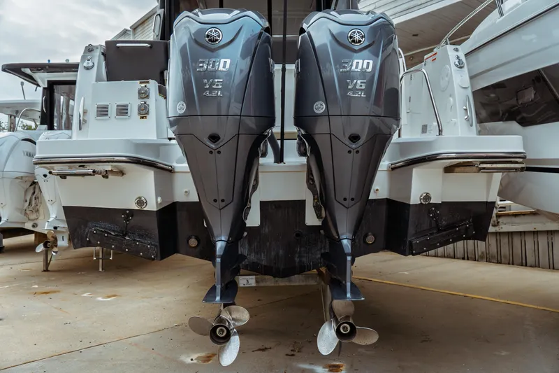 Slide: The Image of 2023 Jeanneau NC 1095 with dual Yamaha 300 V6 outboard engines. - 4