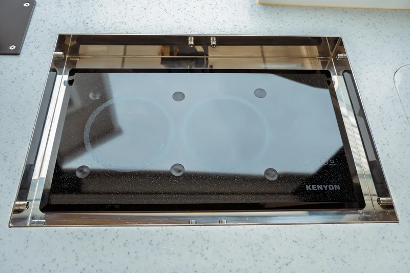 Slide: The Image of Kenyon cooktop on Jeanneau NC 1095 boat, 2023 model, sleek and modern design. - 46