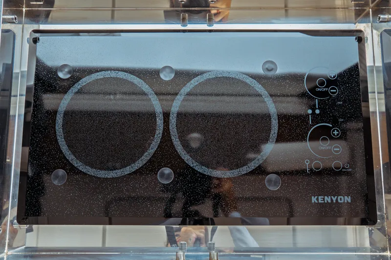 Slide: The Image of Kenyon electric cooktop on Jeanneau NC 1095, 2023 model, featuring dual burners. - 47