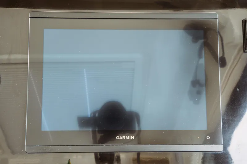 Slide: The Image of Garmin display screen on 2023 Jeanneau NC 1095 boat dashboard. - 60