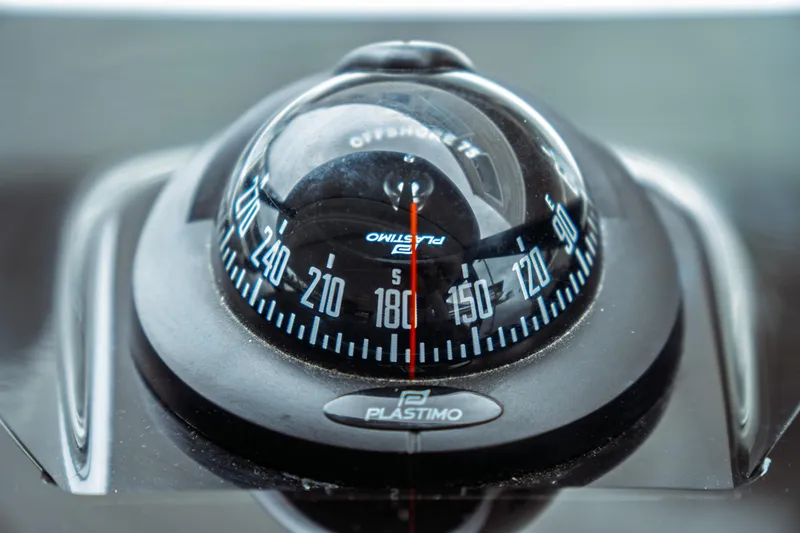 Slide: The Image of Compass on Jeanneau NC 1095 boat, 2023 model, showing directional degrees. - 63