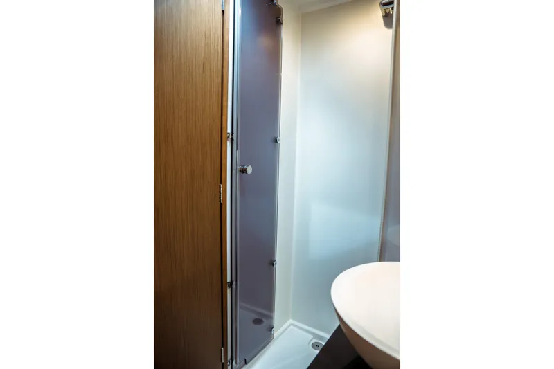 Slide: The Image of 2023 Jeanneau NC 1095 bathroom with modern shower and sleek design. - 80