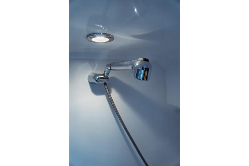 Slide: The Image of Shower fixture in 2023 Jeanneau NC 1095 boat bathroom, under ceiling light. - 82