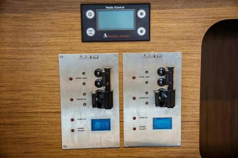 Slide: The Image of Control panel of a 2023 Jeanneau NC 1095 boat with Fischer Panda display. - 86