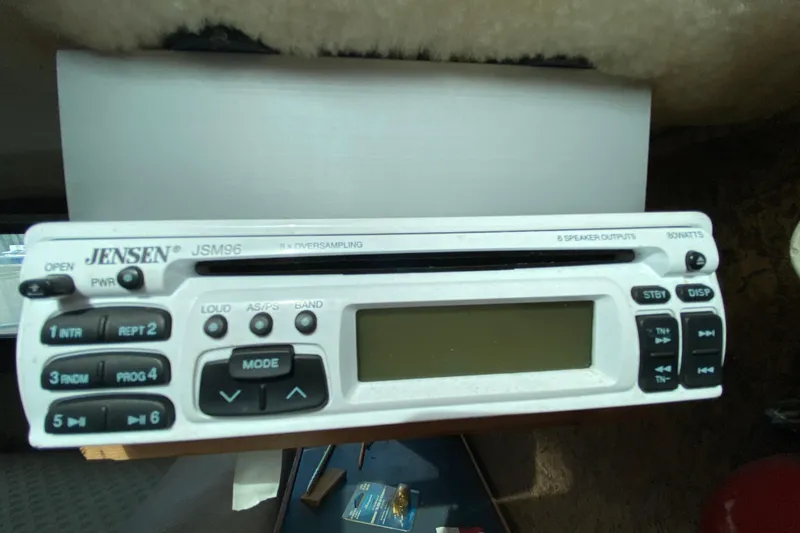 Slide: The Image of Jensen JSM96 stereo system in a 1976 Slickcraft 28 Cruiser boat interior. - 12