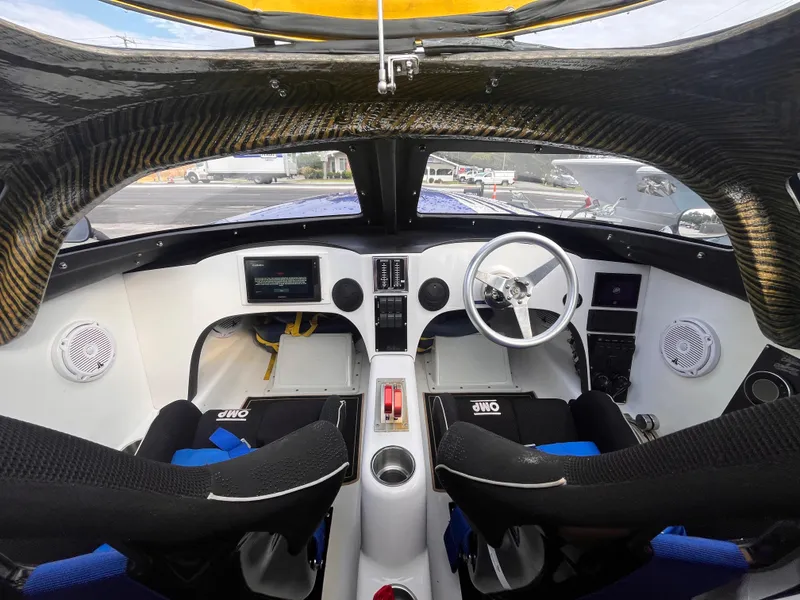 Slide: The Image of Cockpit of 2018 Lavey Craft 28 EVO boat with modern controls and steering wheel. - 10