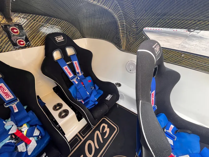 Slide: The Image of Interior of 2018 Lavey Craft 28 EVO with racing seats and safety harnesses. - 13