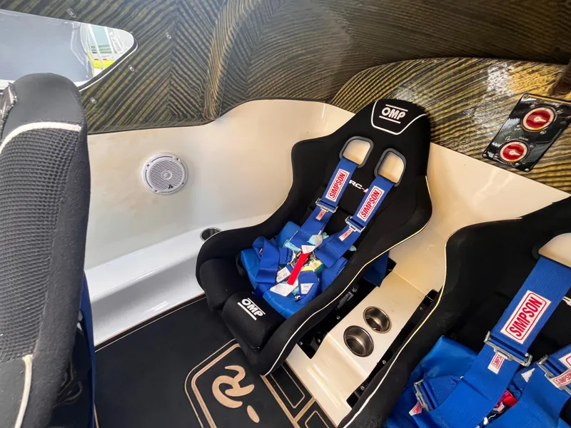 Slide: The Image of Interior of 2018 Lavey Craft 28 EVO with racing seats and safety harnesses. - 14