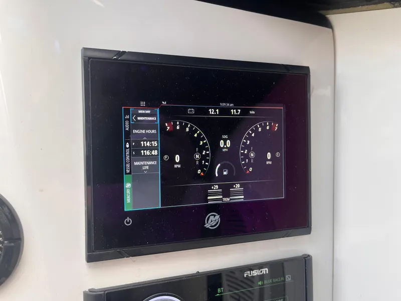 Slide: The Image of Digital dashboard display on a 2018 Lavey Craft 28 EVO boat, showing engine metrics. - 15