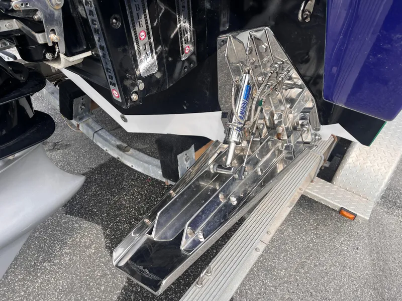 Slide: The Image of 2018 Lavey Craft 28 EVO boat engine and trim tabs detail. - 17