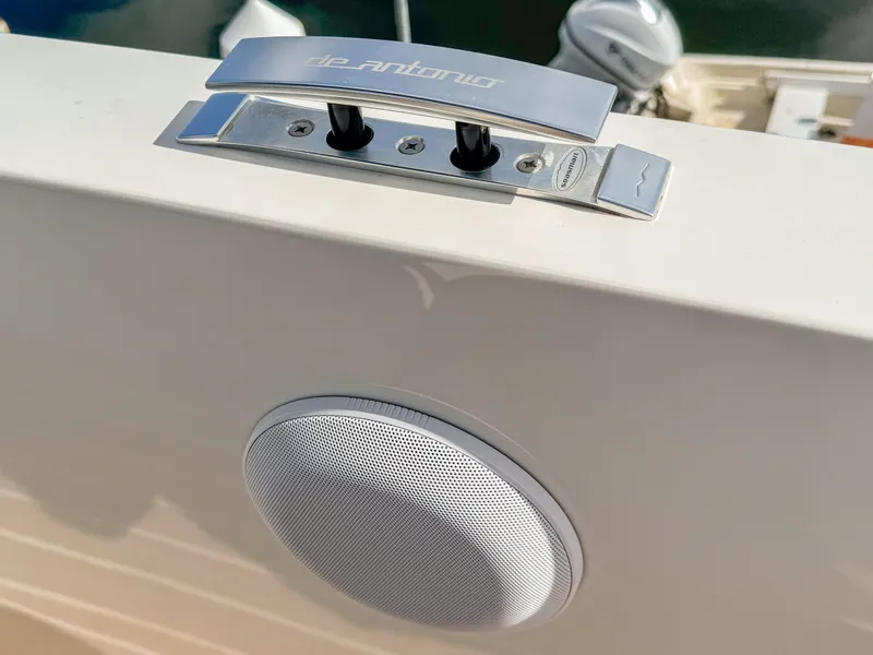 Slide: The Image of 2024 De Antonio Yachts D28 Open, featuring sleek controls and integrated speaker system. - 16