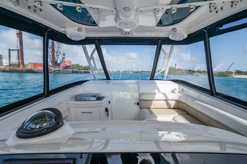 Slide: The Image of Interior view of 2014 Everglades 350LX boat with scenic waterway background. - 18