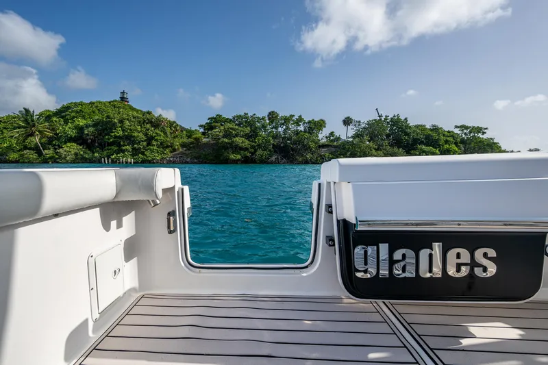 Slide: The Image of 2014 Everglades 350LX boat with scenic island view in the background. - 22