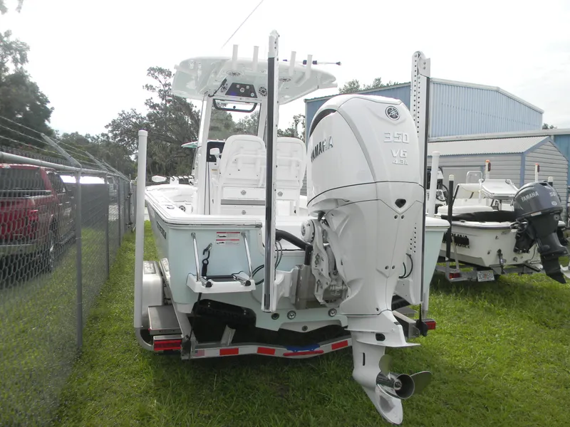 Slide: The Image of 2025 Sportsman Masters 247OE Bay Boat with Yamaha 350 V6 engine on trailer. - 16