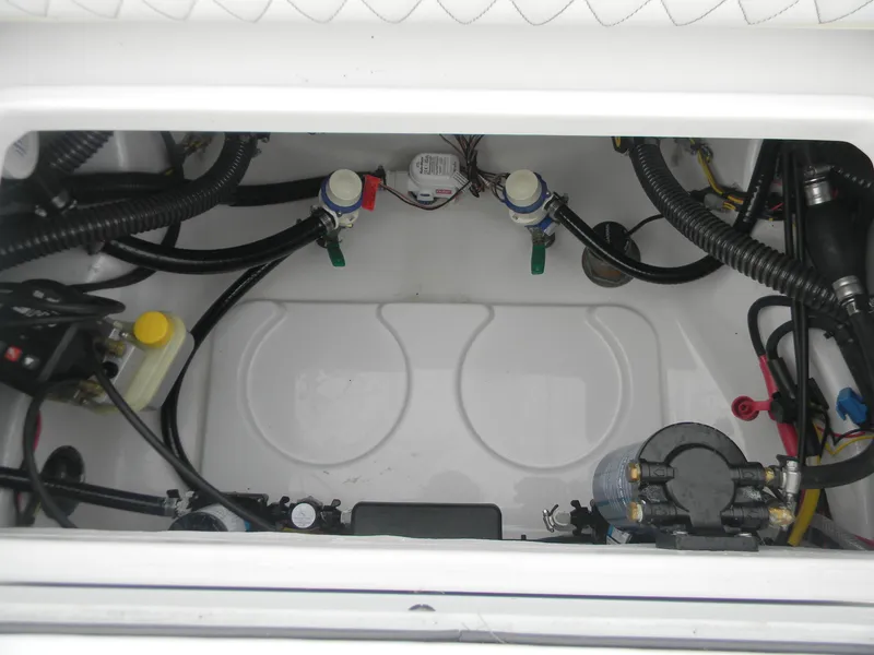 Slide: The Image of 2025 Sportsman Masters 247OE Bay Boat interior wiring and components. - 24
