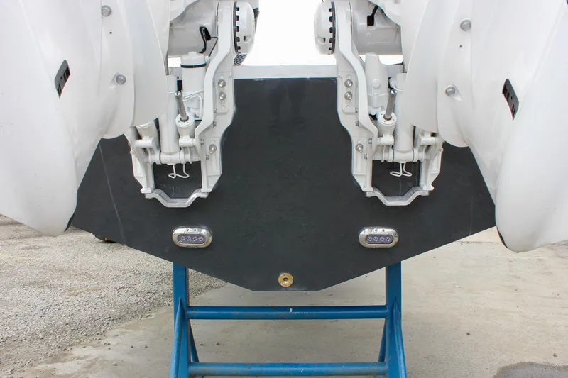 Slide: The Image of Rear view of 2026 Sea Hunt Gamefish 27 boat with dual outboard motors. - 11