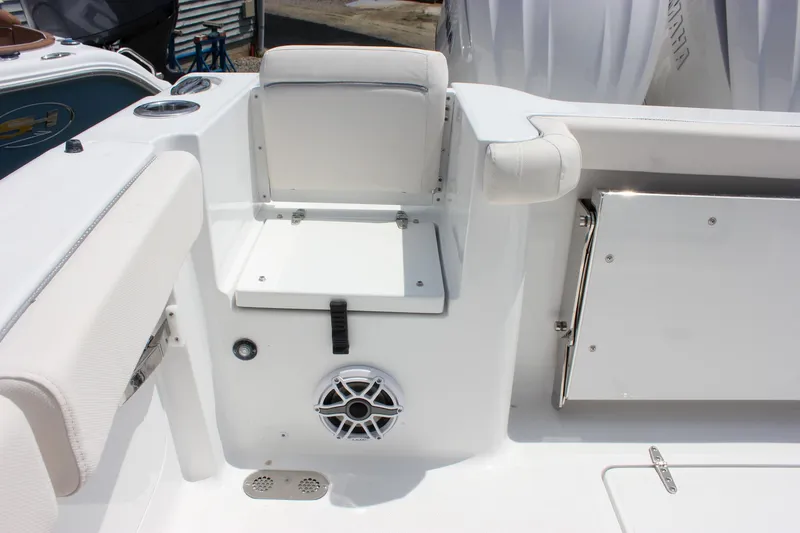 Slide: The Image of 2026 Sea Hunt Gamefish 27 boat interior with seating and speaker detail. - 19