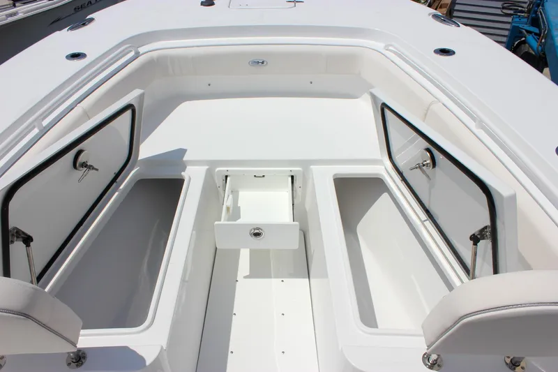 Slide: The Image of 2026 Sea Hunt Gamefish 27 Forward Seating with open storage compartments. - 35