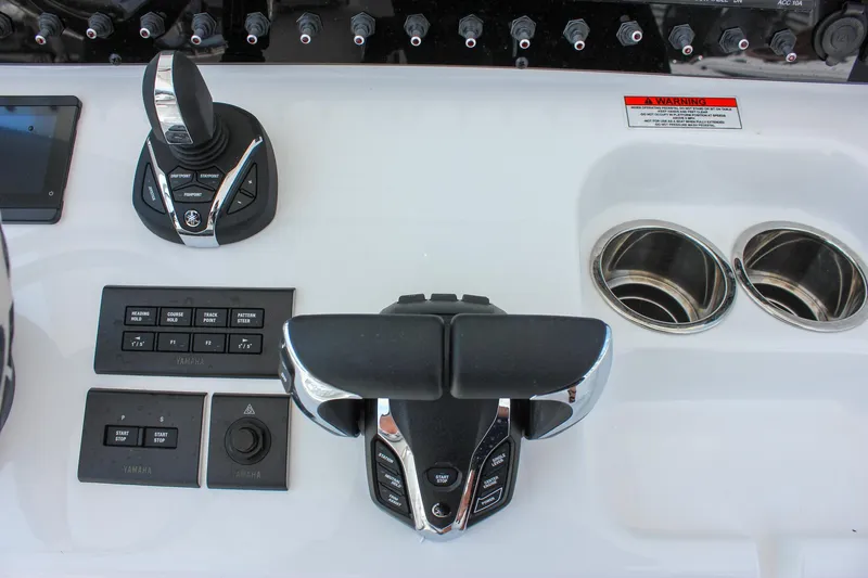 Slide: The Image of 2026 Sea Hunt Gamefish 27 control panel with joystick and throttle controls. - 39