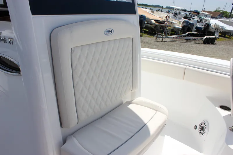 Slide: The Image of 2026 Sea Hunt Gamefish 27 Forward Seating with white cushioned seats and sleek design. - 44