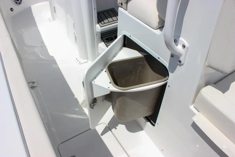 Slide: The Image of 2026 Sea Hunt Gamefish 27 Forward Seating with built-in storage compartment and trash bin. - 52