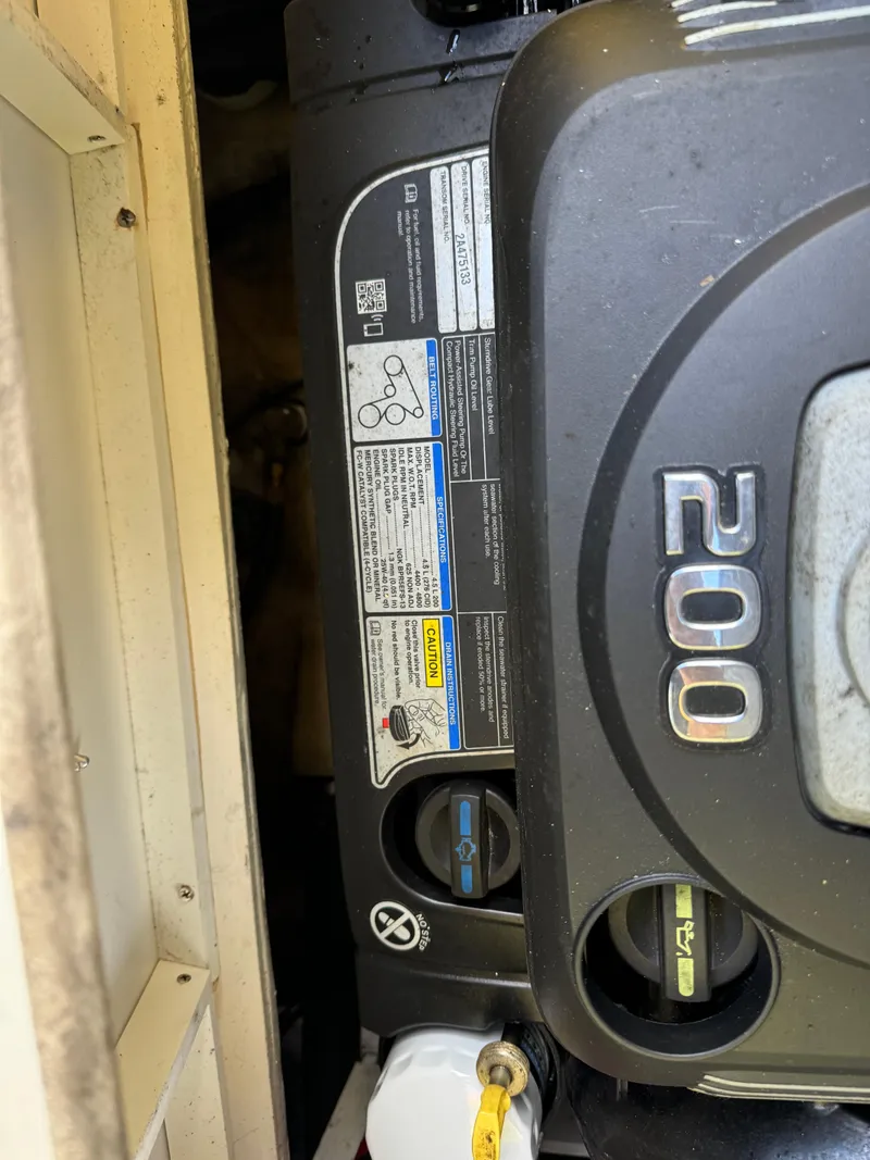 Slide: The Image of Engine compartment of a 2017 Sea Ray SPX 190 boat, showing a 200 horsepower engine. - 6