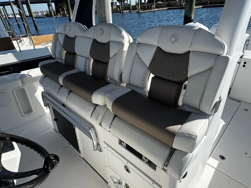 Slide: The Image of Luxurious seating on a 2020 Edgewater 370CC boat, featuring plush, cushioned design. - 5