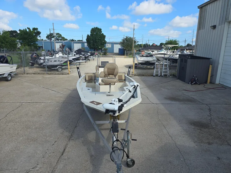 Slide: The Image of 2020 Xpress H20B boat on trailer in outdoor dealership lot. - 5