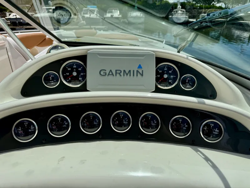 Slide: The Image of Dashboard of a 2005 Monterey 298SS Super Sport boat with Garmin navigation system. - 15