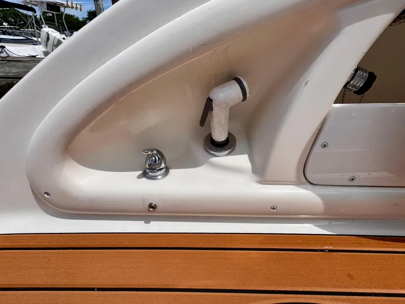 Slide: The Image of 2005 Monterey 298SS Super Sport boat deck with faucet and showerhead. - 19