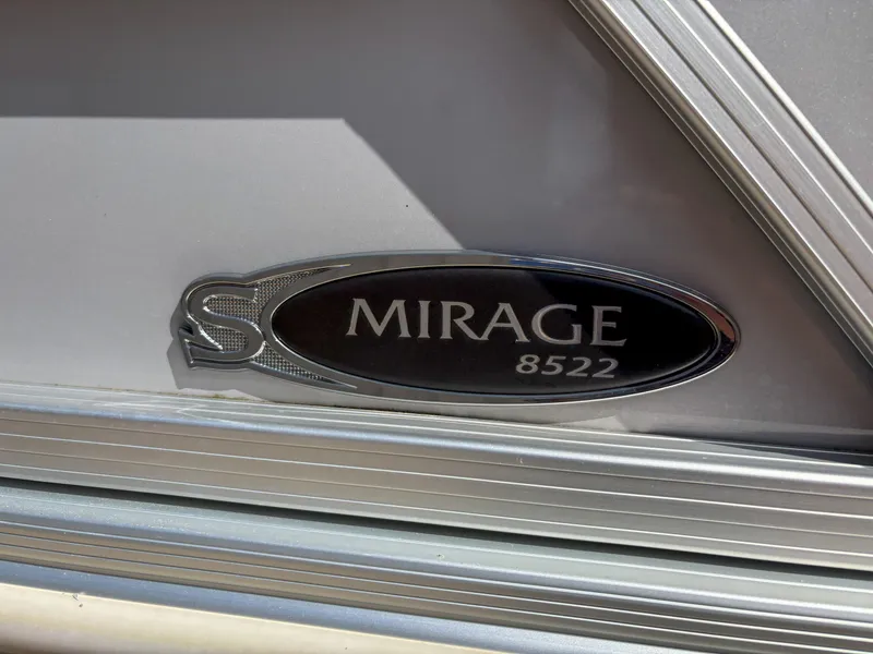 Slide: The Image of 2023 Sylvan Mirage 8522 logo on a metallic surface. - 12