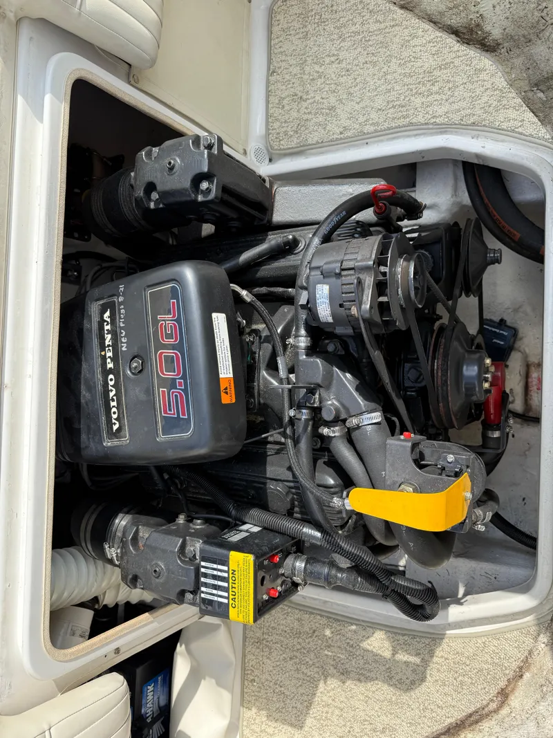 Slide: The Image of 1999 Chris-Craft 200 Bowrider SS engine compartment with Volvo Penta 5.0 GL engine. - 14