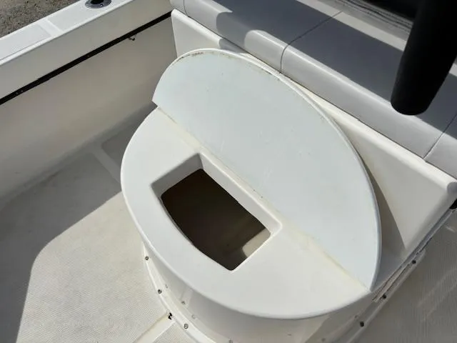 Slide: The Image of 2022 May-Craft 2300 CCX boat seat with storage compartment. - 11