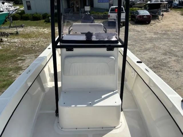 Slide: The Image of 2022 May-Craft 2300 CCX boat interior with center console and seating. - 17