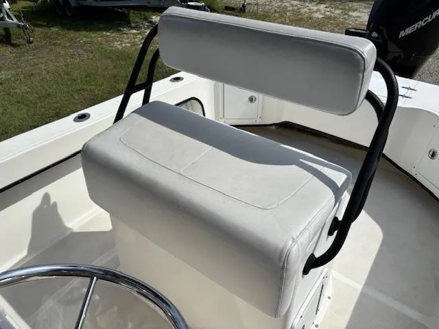 Slide: The Image of 2022 May-Craft 2300 CCX boat seat with white upholstery and black frame. - 20