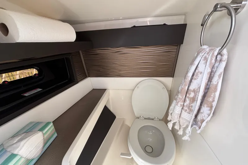 Slide: The Image of Luxurious bathroom in 2018 Sea Ray SLX 310 Outboard boat with modern amenities. - 46