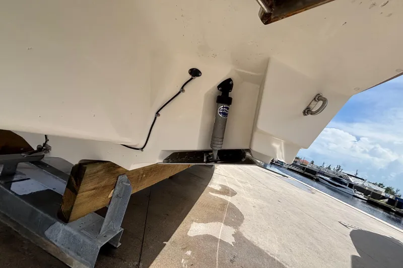 Slide: The Image of 2018 Sea Ray SLX 310 Outboard on trailer at marina, sunny day. - 8