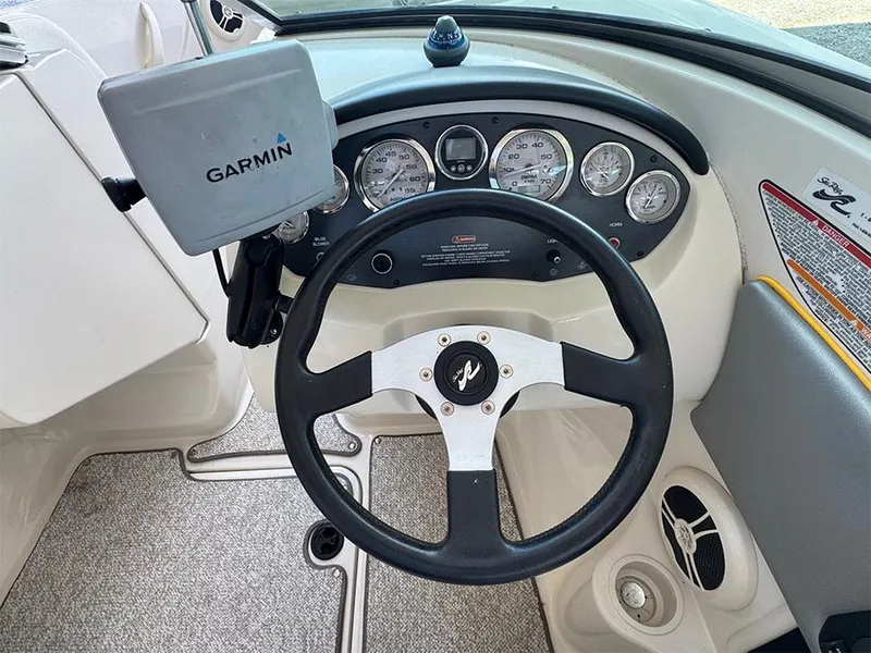 Slide: The Image of Steering wheel and dashboard of 2008 Sea Ray 185 Sport boat with Garmin GPS. - 10