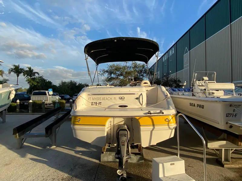 Slide: The Image of 2001 Chaparral Sunesta 232 boat at marina, Ft. Myers Beach, FL, sunny day. - 5