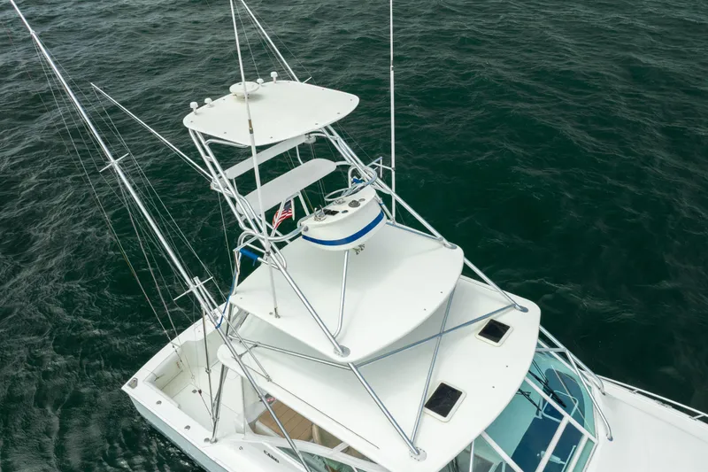 Slide: The Image of Aerial view of 2004 Cabo 40 Express boat on open water. - 11