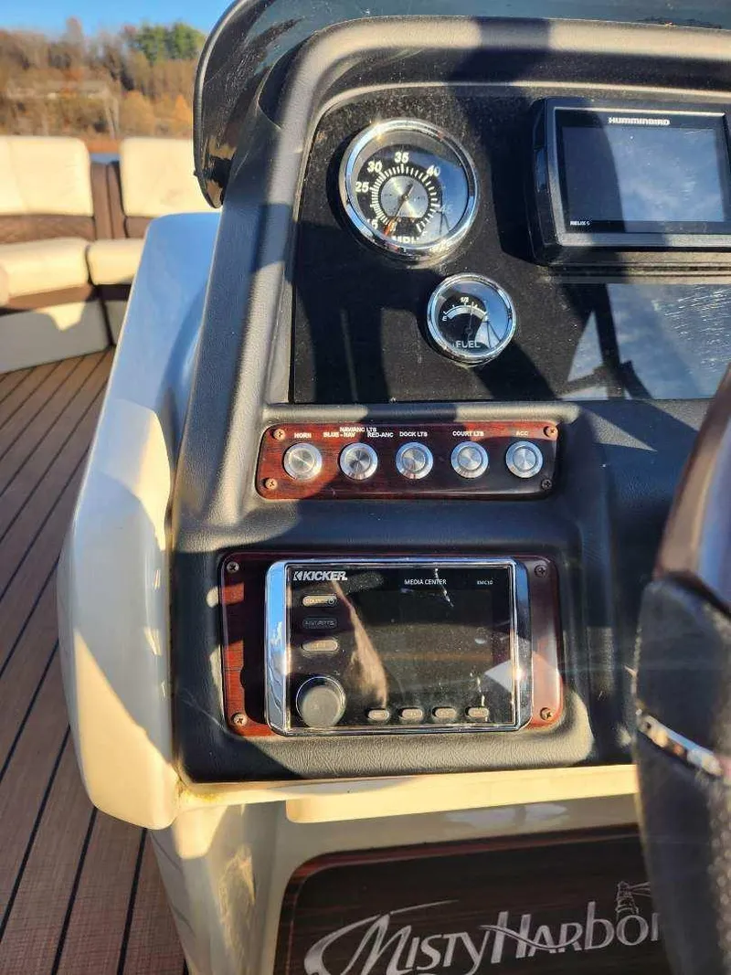 Slide: The Image of Control panel of 2019 Misty Harbor 2685 Skye SE boat with gauges and audio system. - 14