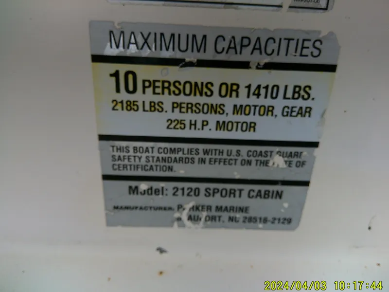 Slide: The Image of Capacity label on 2008 Parker 2120 Sport Cabin, 10 persons or 1410 lbs, 225 HP motor. - 19