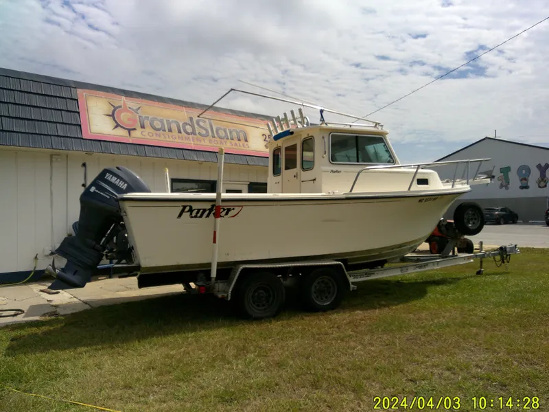Slide: The Image of 2008 Parker 2120 Sport Cabin boat on trailer at Grand Slam Consignment Boat Sales. - 2