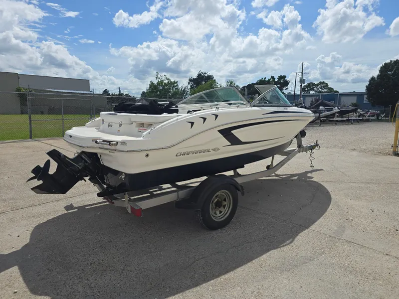Slide: The Image of 2016 Chaparral 18 H2O Sport boat on trailer under a cloudy sky. - 5