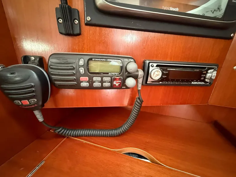 Slide: The Image of VHF radio and stereo system on 2003 Beneteau 393 yacht interior. - 37