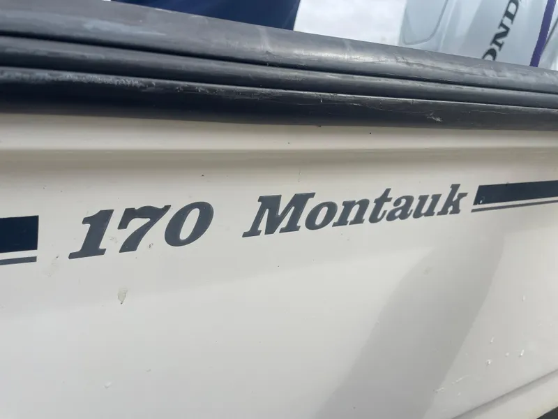 Slide: The Image of 2008 Boston Whaler 170 Montauk boat nameplate close-up. - 14